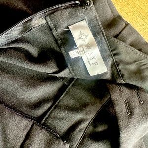 Black jumpsuit with cross strapped back